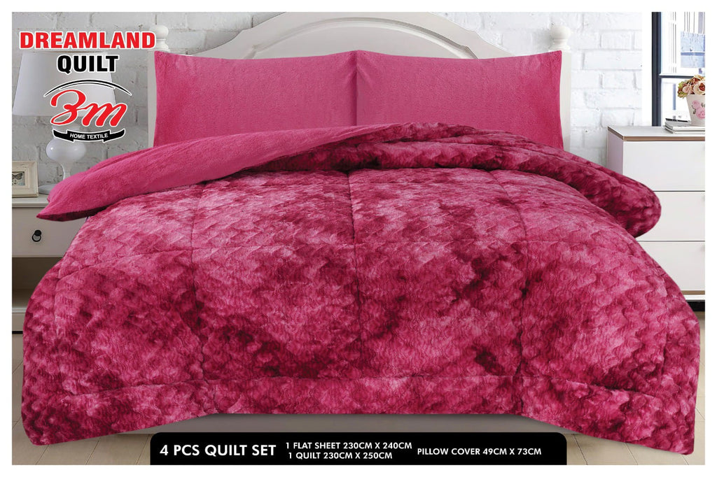 Pink quilt set with matching pillow covers on a bed, featuring the Dreamland Quilt brand.